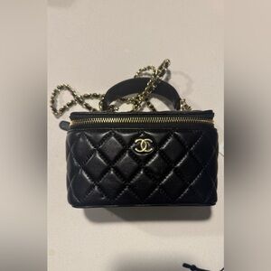 Chanel Black Quilted Mini Bag with Gold Accents